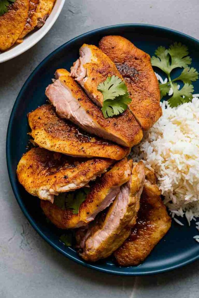 Schweinekoteletts mit Taco-Gewürz und Reis